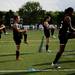 The Huron High School team stretches before the game against Skyline on Thursday, May 30. Daniel Brenner I AnnArbor.com